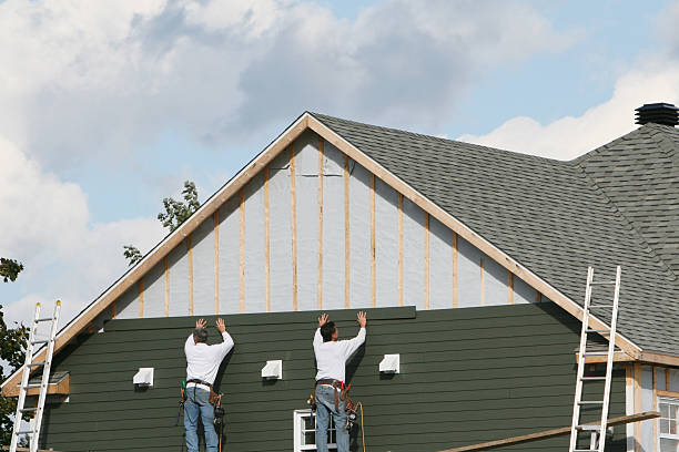 Professional Siding technician working in Framingham, MA